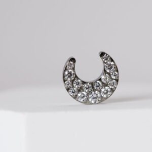 Labret de titanio con diseño de luna y zirconias